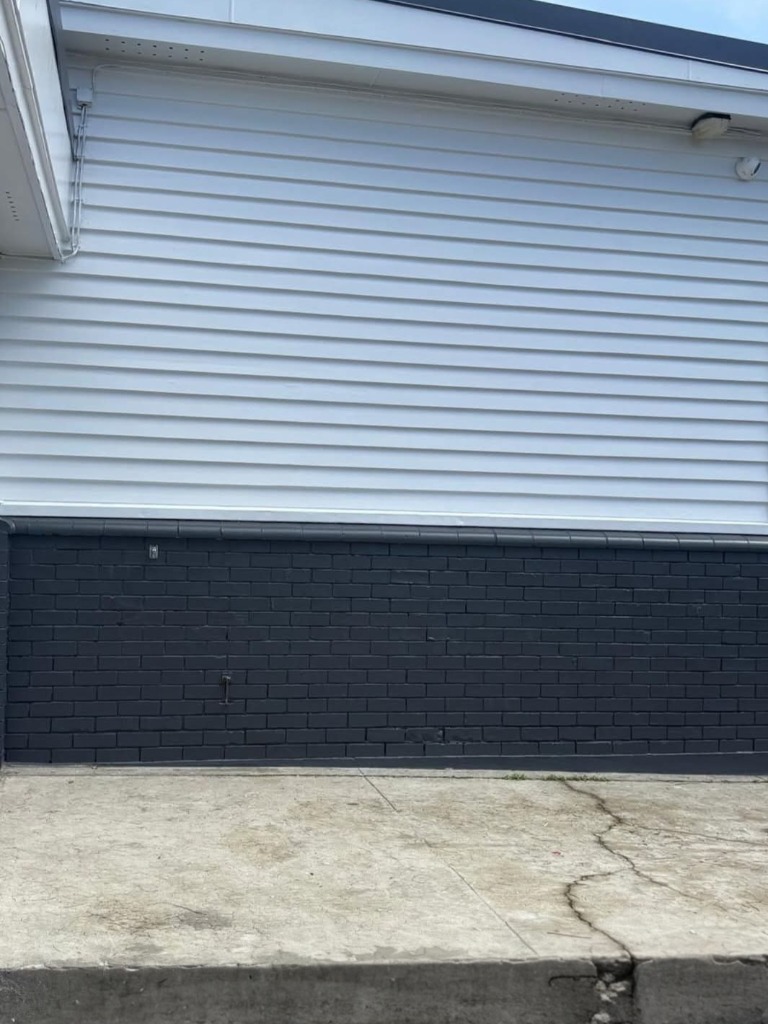 Contrasting brick and wood painting